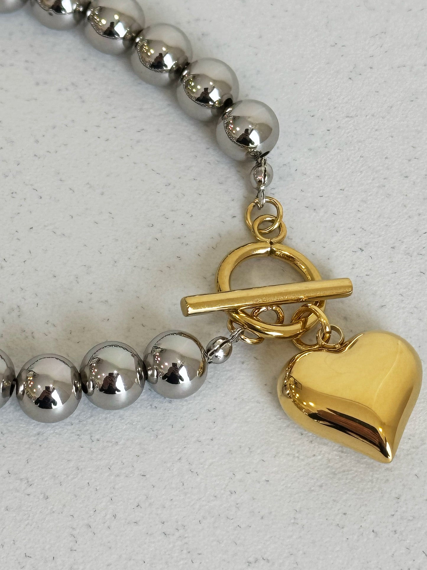 Bracciale cuore bicolor