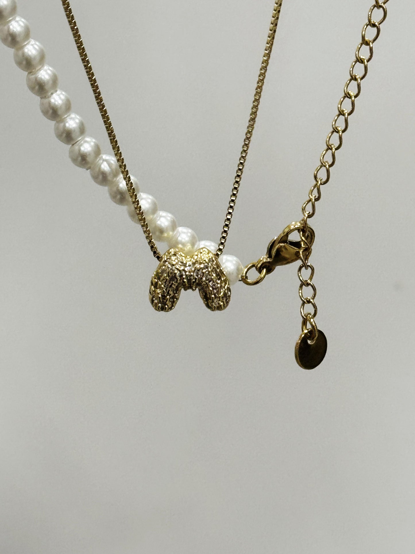 Collana piccola iniziale