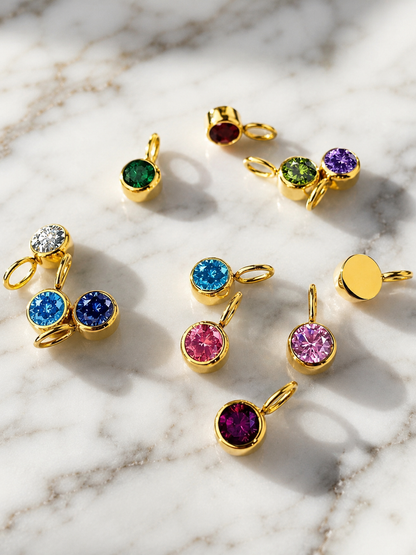 Charm punto luce tondo